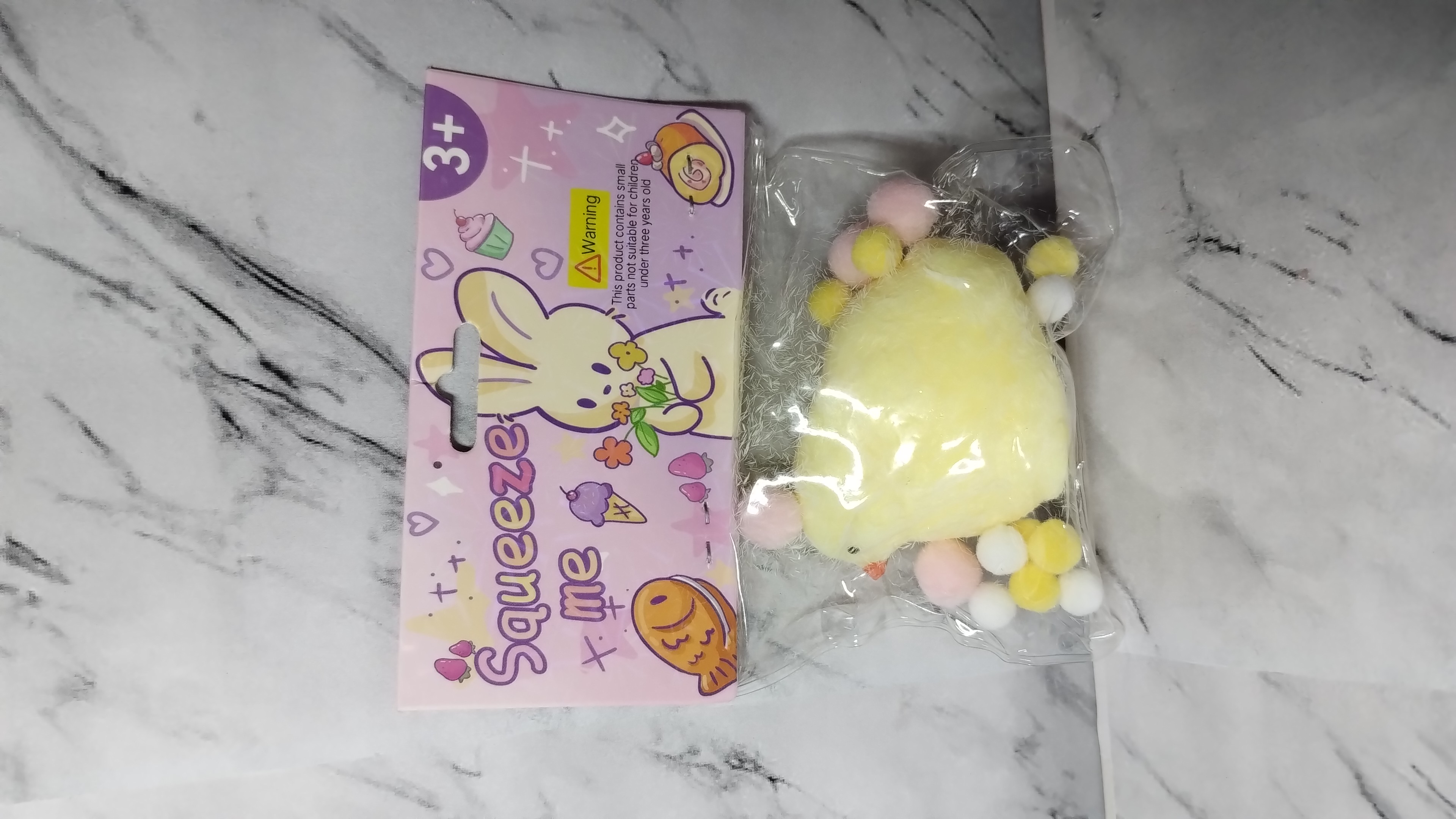 Pollito squishy en bolsa