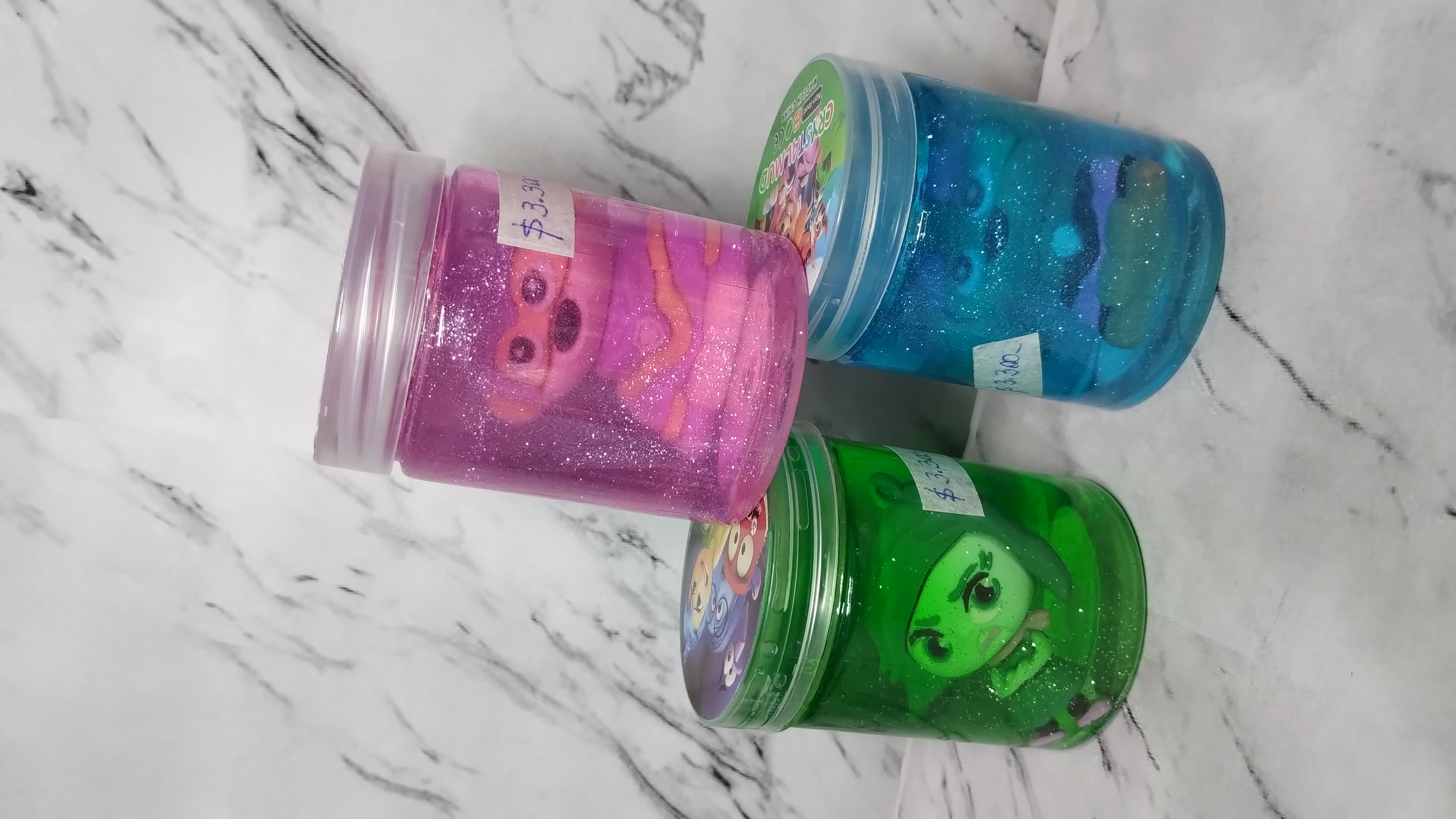 Slime con brillo y muñequito